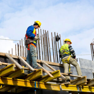 workers-examining-work